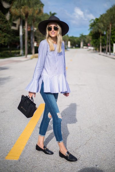 Light blue peplum blouse with bell sleeves and black casual loafers