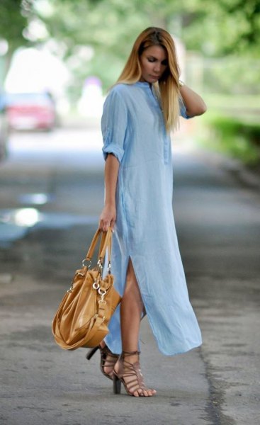 Light blue maxi shirt dress with side slit and black leather handbag