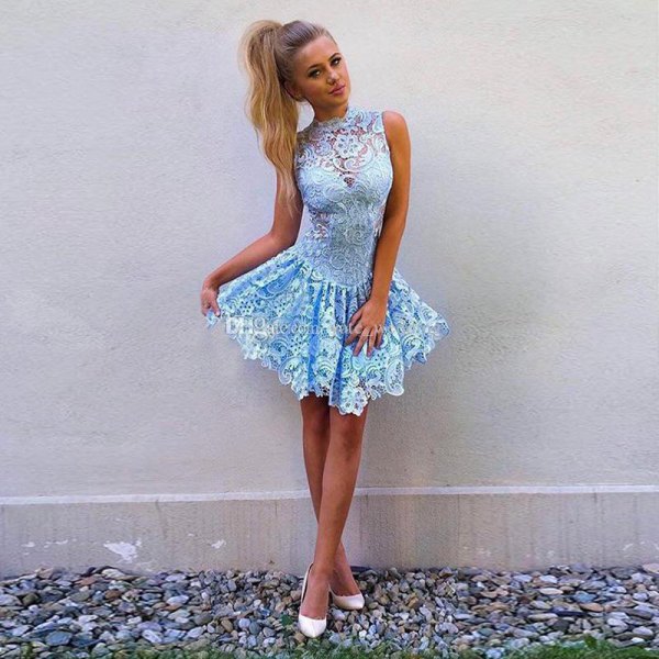 Light blue lace sleeveless short skater dress with white heels