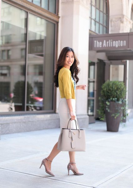Light green cardigan with half sleeves and white pencil skirt