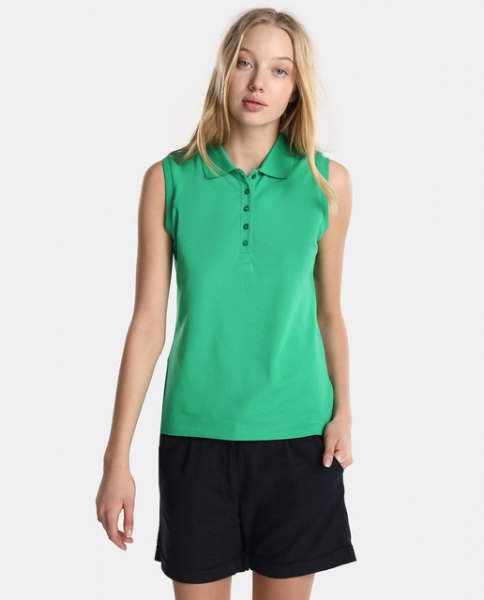 light green sleeveless polo shirt with black flowy shorts