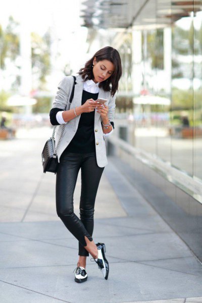 Light gray blazer with dark blue skinny jeans and white suede
shoes