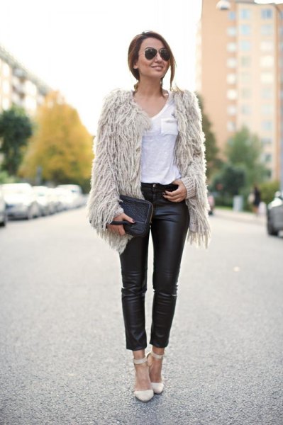 light gray faux fur jacket with high waist black leather leggings