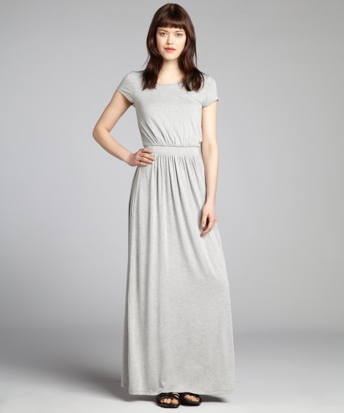Light gray maxi jersey knit dress with a gathered waist and a flared silhouette