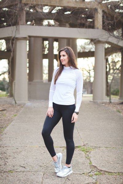 Light gray long sleeve turtleneck t-shirt, black running tights and
silver sneakers