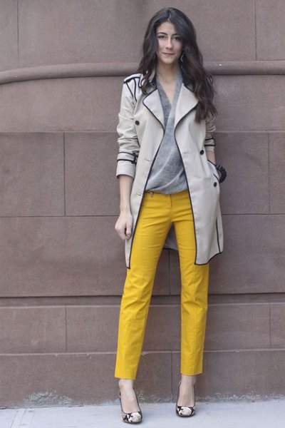 light gray trench coat with yellow ankle pants