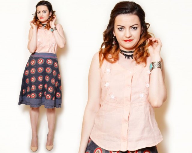 Lightweight peach sleeveless shirt with floral embroidery and navy blue printed skirt