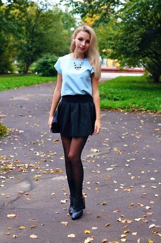 Light sky blue blouse with black mini skater skirt