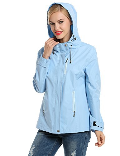 Light sky blue hooded nylon sport jacket with ripped jeans