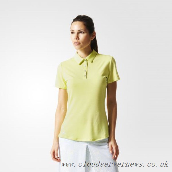 Pale yellow polo shirt with white knee length straight skirt