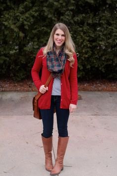 Long red cardigan with grey-navy plaid scarf and knee-high brown
boots