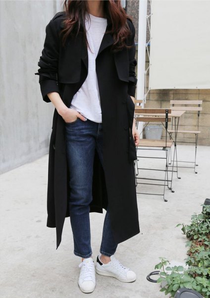 Black maxi long coat with sweater and white sneakers