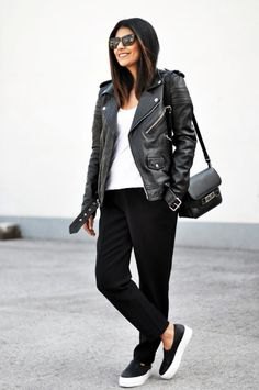 Motorcycle jacket with slim fit jeans and black leather sneakers