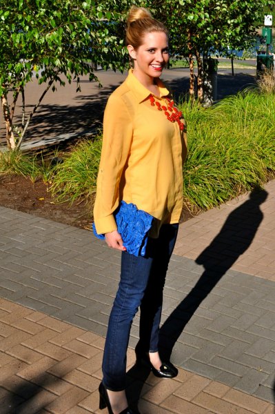 Mustard button-down boyfriend shirt and dark blue slim-fit jeans