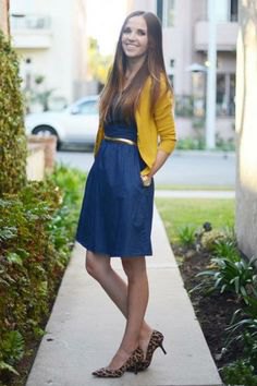 Mustard cropped cardigan with blue belted knee-length denim dress