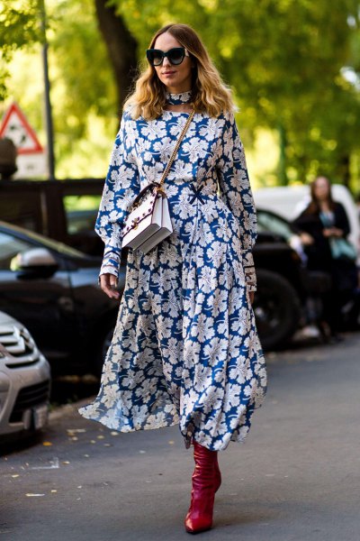 Navy blue and white floral midi dress with black leather boots