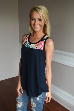 Navy color block flowy tank top and ripped jeans