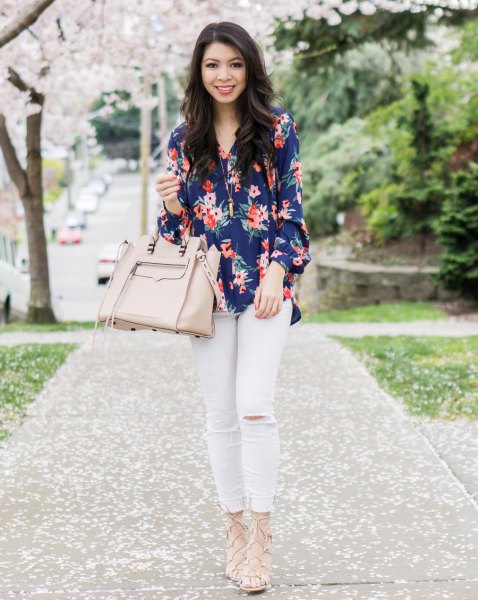 Navy blue floral print button down shirt and white jeans
