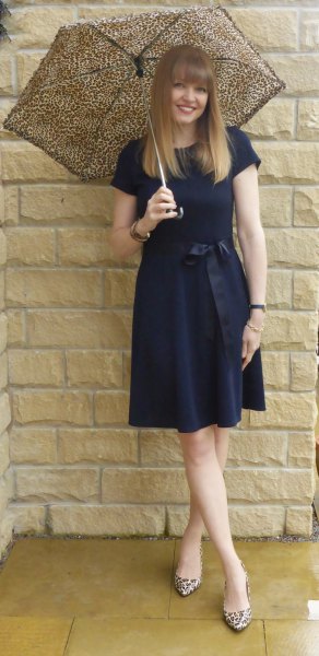 Navy blue ruched waist knee length dress with leopard print heels