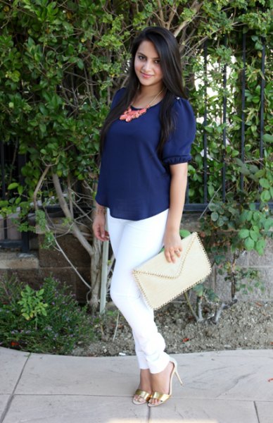 Navy blue short sleeve scoop neck blouse and white skinny
jeans