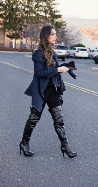 dark blue sweater jacket with black overknee leather boots with high heels