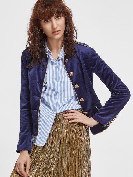 Navy blue velvet sport jacket with striped shirt and pleated skirt