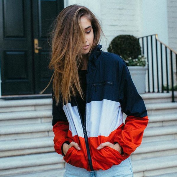 Navy, white, and red color block windbreaker with light blue boyfriend jeans