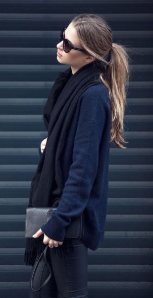 Navy blue cardigan with black long scarf and leather pants