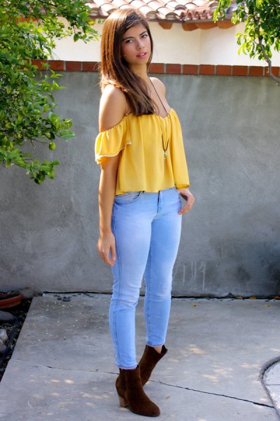 strapless yellow top with sky blue jeans