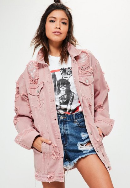 Oversized blush denim jacket styled with a white printed t-shirt and blue high-rise denim shorts