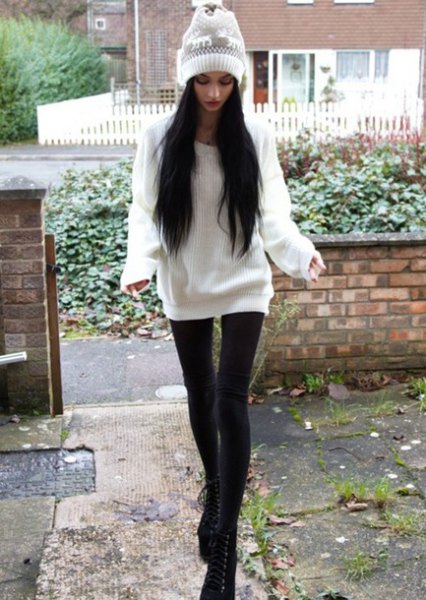 Oversized sweater with white knit hat and leggings