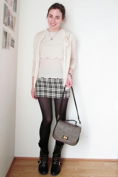 pale pink blouse with matching cardigan and mini skirt