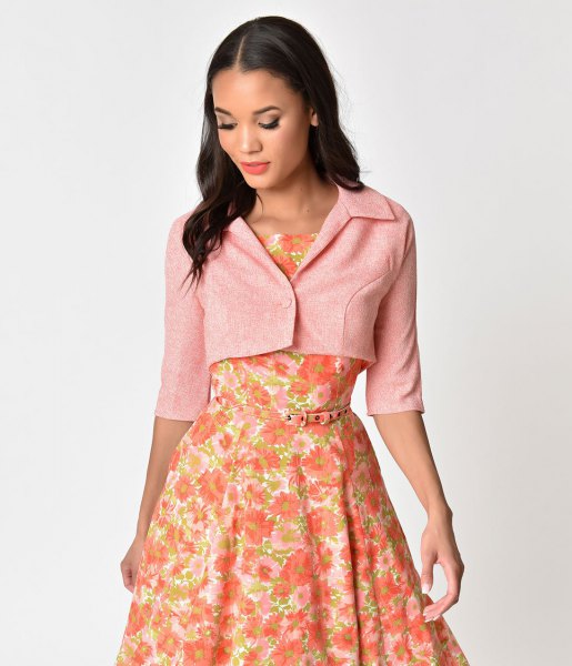 Pale pink short sleeve jacket with blush floral flared midi dress