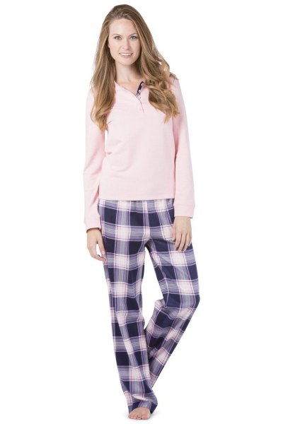 Wear it with a long-sleeved pale pink sweater and black and white
checked trousers