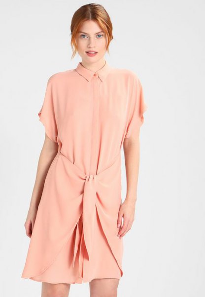 Peach baggy shirt dress with short sleeves and tie waist