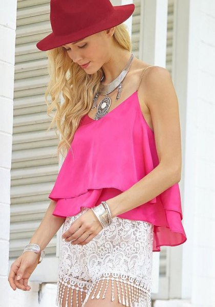 pink sleeveless chiffon top with white lace mini shorts