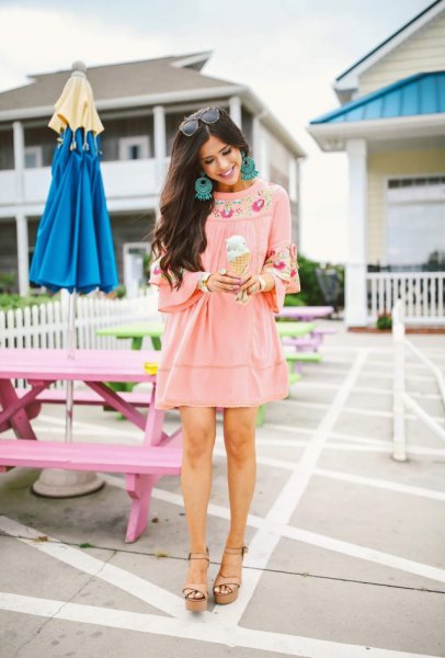 Pink boho style mini dress with tribal print and wedge sandals