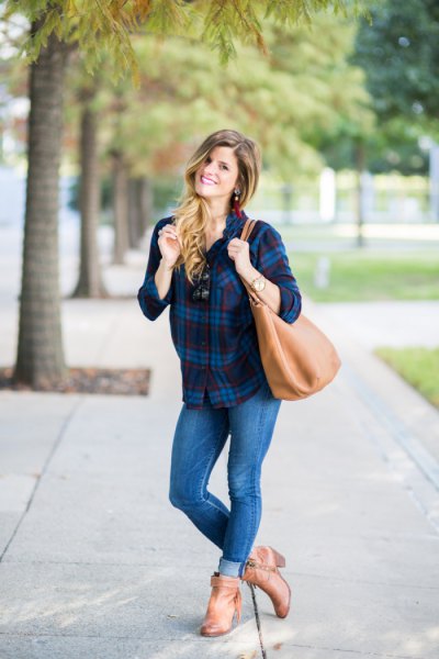 Pair with a plaid boyfriend shirt, cuffed skinny jeans and brown heeled leather boots to complement