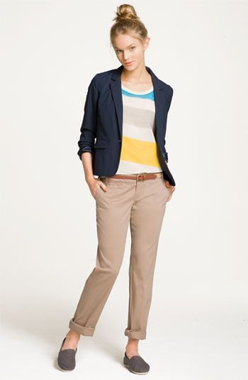 Rainbow sweater with dark blue travel blazer and cropped pants