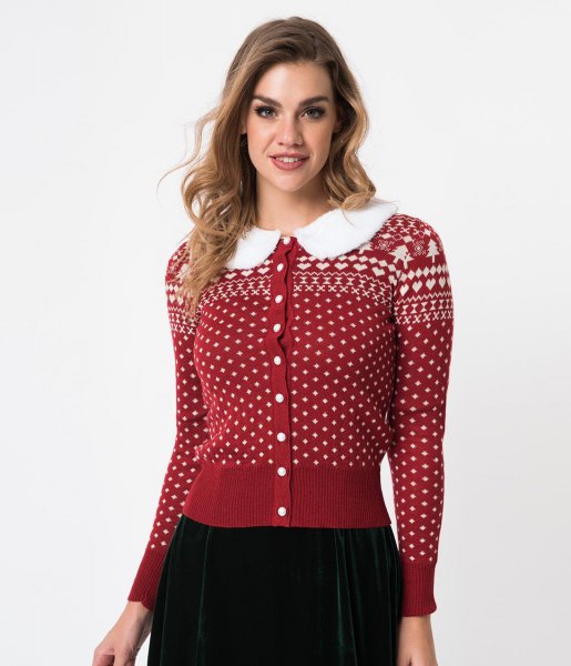 Red and white christmassy printed cardigan with buttons and black skirt