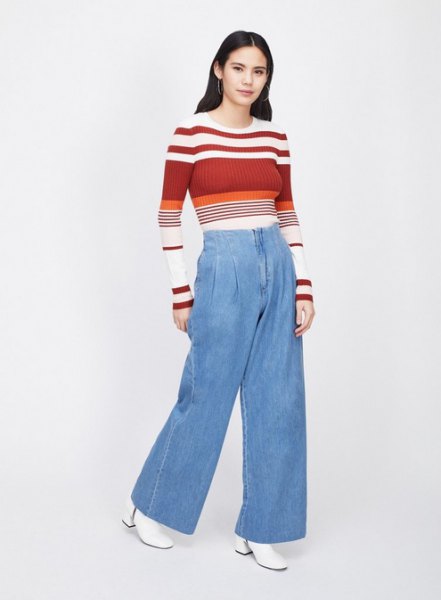 Red and white color block sweater with light blue wide-leg jeans