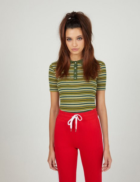 Red and yellow collarless striped polo shirt with jogging pants