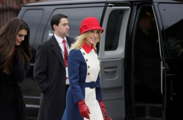 Red bush hat with white and blue belted coat dress