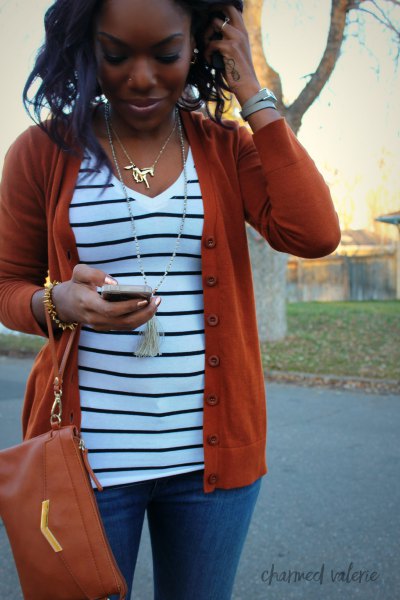 Red cardigan with white and black striped V-neck top