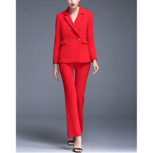 Red double-breasted suit jacket with flared trousers and open heels