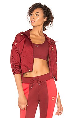 Red mini bomber jacket with crop top and running pants