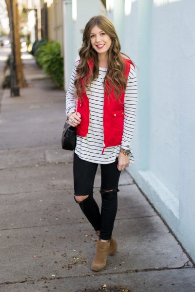 Red quilted waistcoat with black and white striped long-sleeved T-shirt