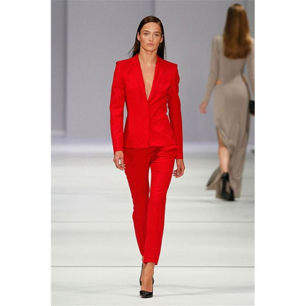 red suit with black heels and no blouse