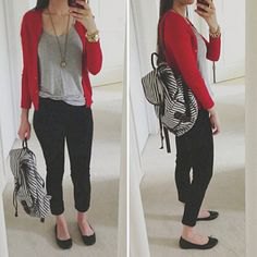 Red sweater with gray scoop neck t-shirt and black cropped jeans