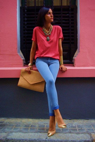 Red t-shirt with sky blue jeans and statement necklace